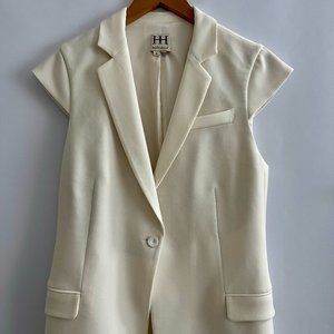 Creme Haute Hippie sleeveless casual vest with dual pockets and button closure a